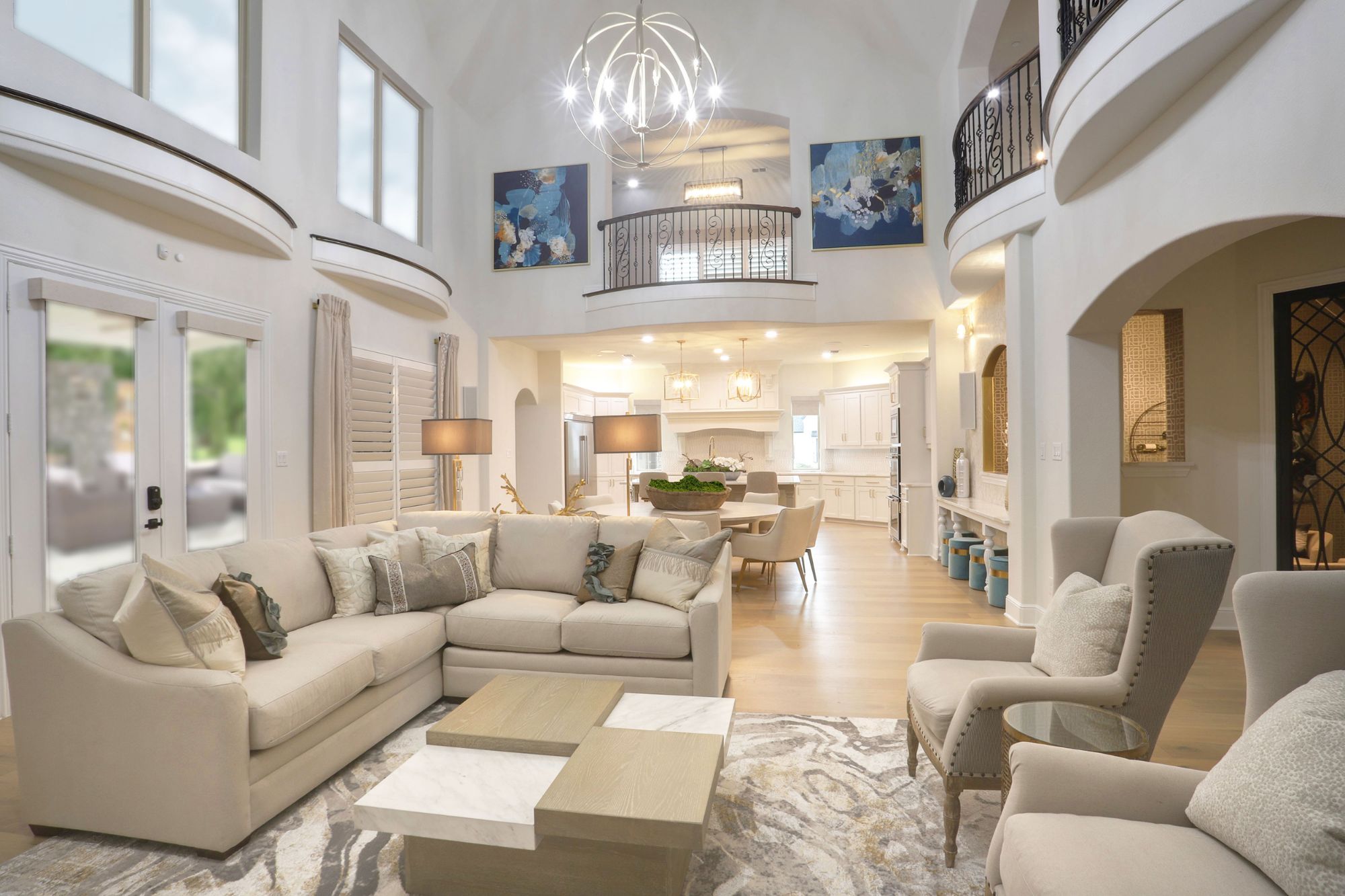Large living room with tall ceilings and custom furniture