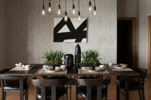 Modern dining room with black table and chairs